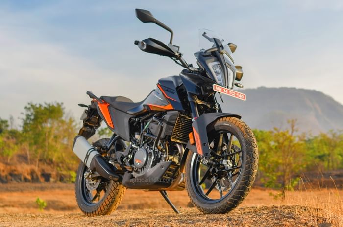 Should I buy the KTM 390 ADV X or Triumph Scrambler 400 X for touring? KTM 390 Adventure X price, performance, features.